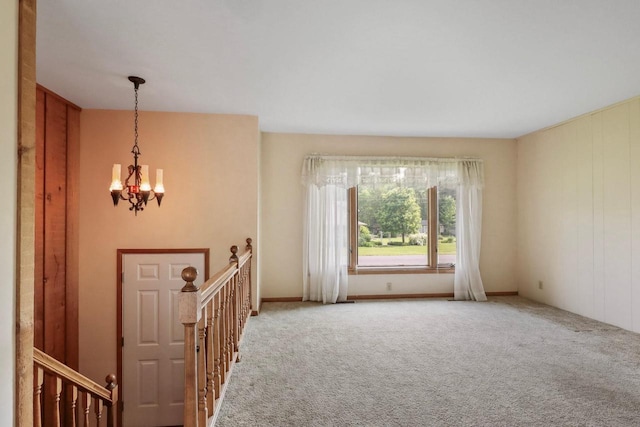 6521 Batavia Ave, Wisconsin Rapids, WI 54494 - foyer featuring a chandelier and carpet flooring