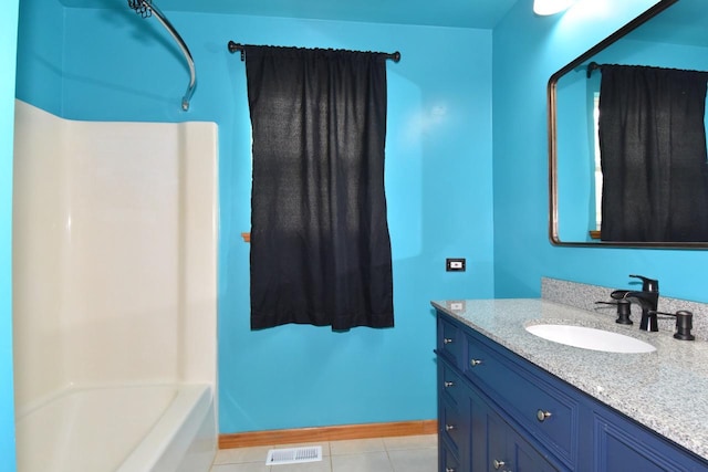 6023 241st Ave, Salem, WI 53168 - bathroom with vanity, tile patterned floors, and baseboards