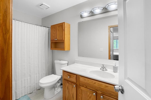 2422 Fox River Pkwy Unit B, Waukesha, WI 53189 - bathroom with vanity, toilet, tile patterned flooring, and a shower with shower curtain