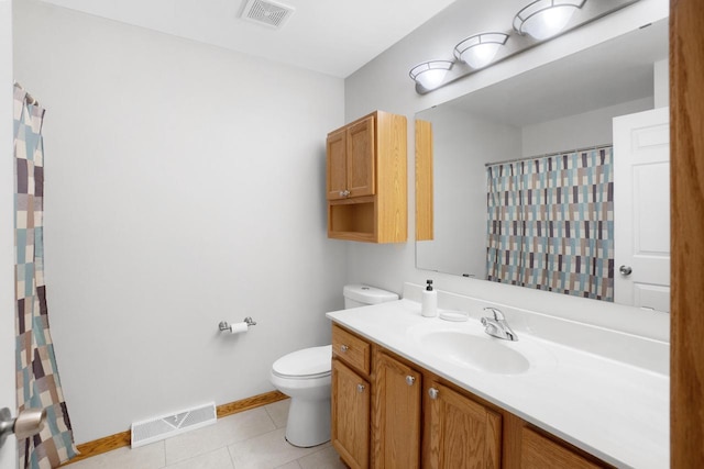 2422 Fox River Pkwy Unit B, Waukesha, WI 53189 - bathroom with toilet, vanity, baseboards, tile patterned floors, and curtained shower