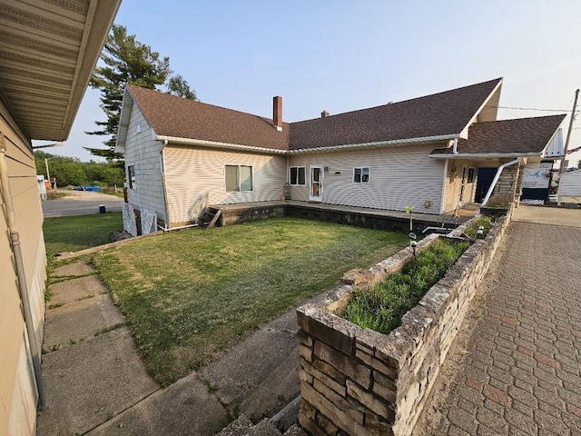 1004 Water Ave, Hillsboro, WI 54634 - view of front of home with a front yard and a chimney