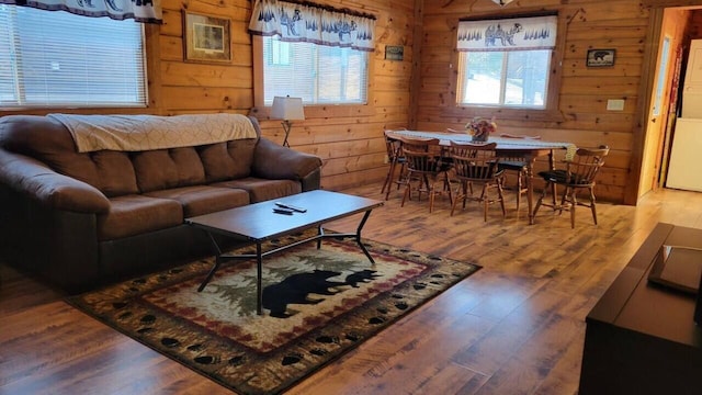 716 Skatepark Ct, Warrens, WI 54666 - living room featuring wooden walls and wood finished floors