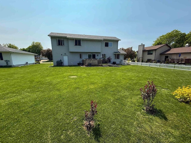 1053 Eastman Ln, Fond Du Lac, WI 54935 - rear view of house featuring a wooden deck