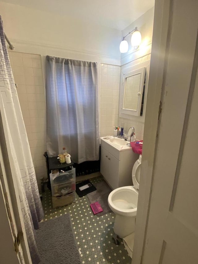 2919 N 50th St Unit 2919A, 2921, Milwaukee, WI 53210 - full bathroom with toilet, vanity, a shower with curtain, and tile walls
