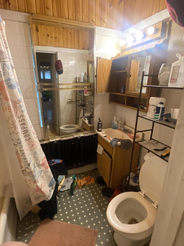 2919 N 50th St Unit 2919A, 2921, Milwaukee, WI 53210 - full bath featuring toilet, a shower with shower curtain, tile walls, a tub to relax in, and vanity