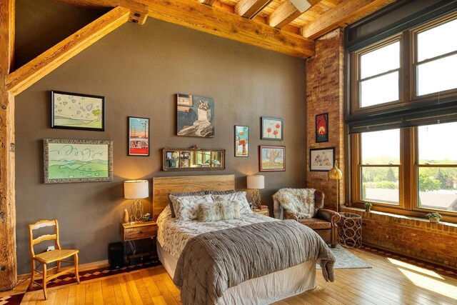 1545 Arboretum Dr Unit 315, Oshkosh, WI 54901 - bedroom with hardwood / wood-style floors and wood ceiling with exposed beams