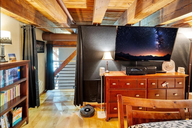 1545 Arboretum Dr Unit 315, Oshkosh, WI 54901 - bedroom with wood ceiling with exposed beams and light wood-style flooring