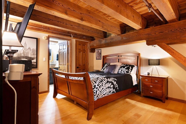 1545 Arboretum Dr Unit 315, Oshkosh, WI 54901 - bedroom with light wood-style floors, wooden ceiling with exposed beams, and baseboards