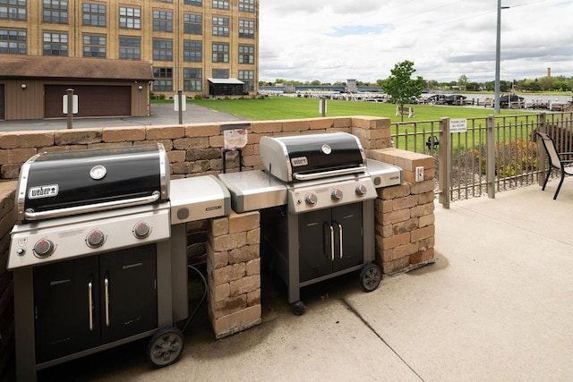 1545 Arboretum Dr Unit 315, Oshkosh, WI 54901 - view of patio with a grill