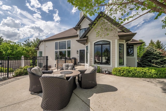 5015 Joshua Dr, West Bend, WI 53090 - view of patio featuring an outdoor fire pit