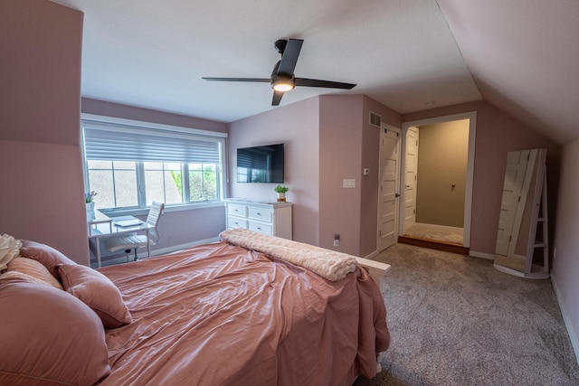 5015 Joshua Dr, West Bend, WI 53090 - carpeted bedroom with lofted ceiling, a ceiling fan, and baseboards