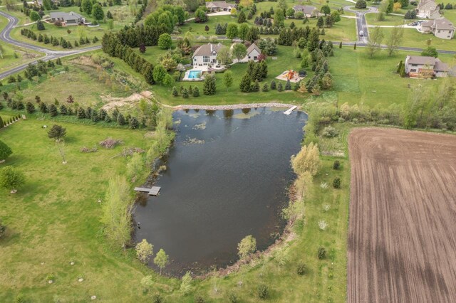 5015 Joshua Dr, West Bend, WI 53090 - aerial view of property's location with a nearby body of water