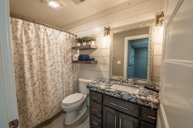 5015 Joshua Dr, West Bend, WI 53090 - bathroom featuring toilet, vanity, and a shower with curtain