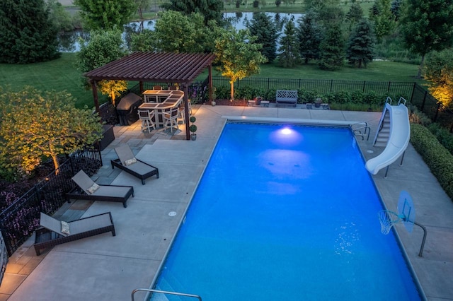 5015 Joshua Dr, West Bend, WI 53090 - view of swimming pool with a water slide, a gazebo, and a patio