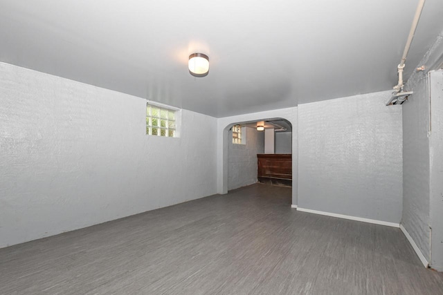 3380 N 39th St, Milwaukee, WI 53216 - unfurnished room with arched walkways and wood finished floors
