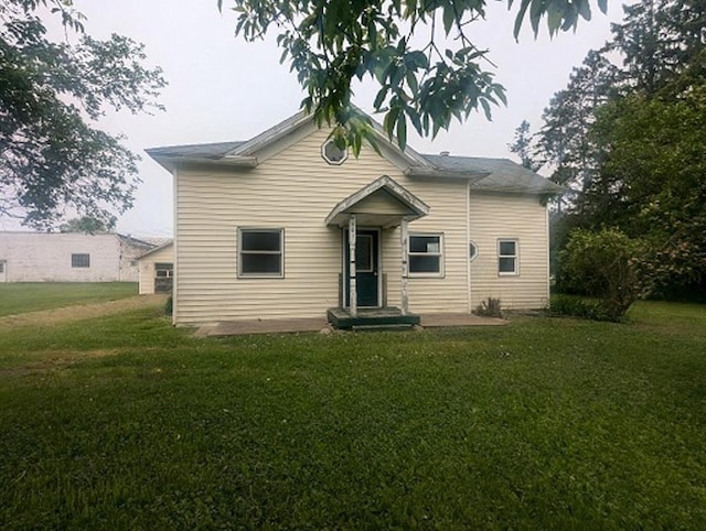 501 S Main St, Loyal, WI 54446 - view of front of property featuring a front lawn