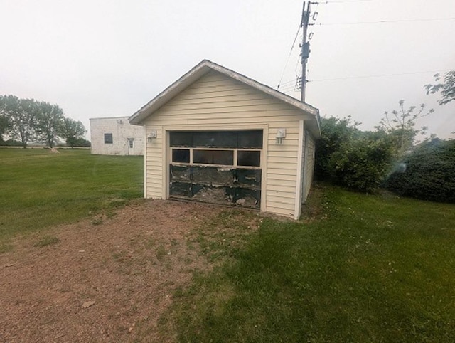 501 S Main St, Loyal, WI 54446 - detached garage featuring driveway