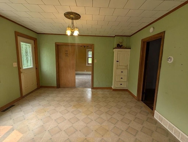 501 S Main St, Loyal, WI 54446 - empty room featuring ornamental molding, baseboards, and light floors