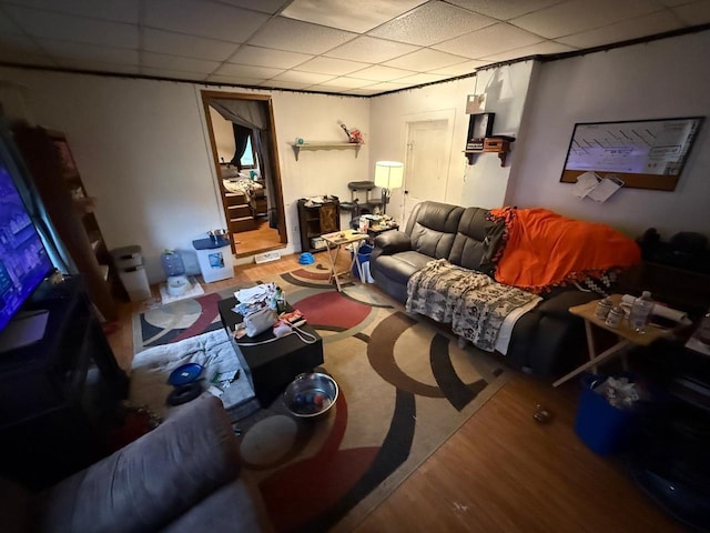 301 S Galena St, South Wayne, WI 53587 - living area featuring a paneled ceiling and wood finished floors