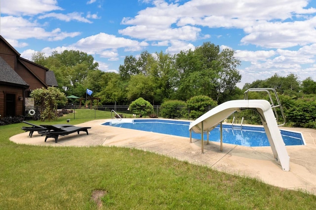 W395S3611 Hardscrabble Rd, Dousman, WI 53118 - view of pool featuring a water slide, a patio, and view of wooded area