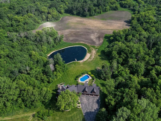 W395S3611 Hardscrabble Rd, Dousman, WI 53118 - aerial view of property's location featuring a heavily wooded area and a large body of water
