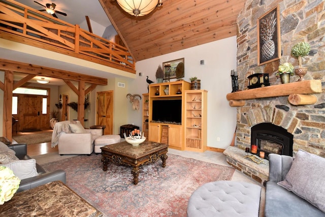 W395S3611 Hardscrabble Rd, Dousman, WI 53118 - carpeted living area featuring a fireplace, high vaulted ceiling, and a ceiling fan