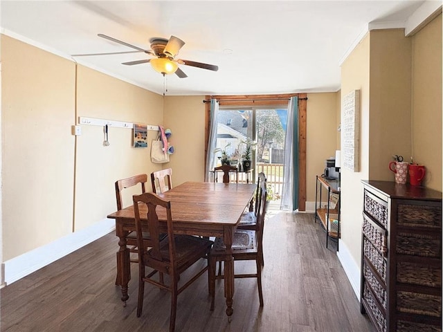 20 N 1st St, Luck, WI 54853 - dining room with a ceiling fan, wood finished floors, ornamental molding, and baseboards