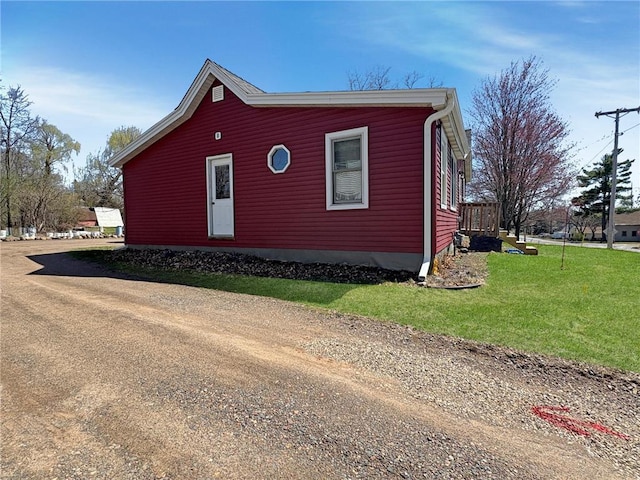 20 N 1st St, Luck, WI 54853 - view of property exterior featuring a lawn