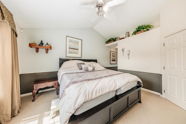 N17W26535 Meadowgrass Cir Unit G, Pewaukee, WI 53072 - bedroom featuring light carpet, vaulted ceiling, a ceiling fan, and baseboards