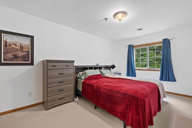 1507 Clarence Ct Unit 5, West Bend, WI 53095 - bedroom with light carpet and baseboards