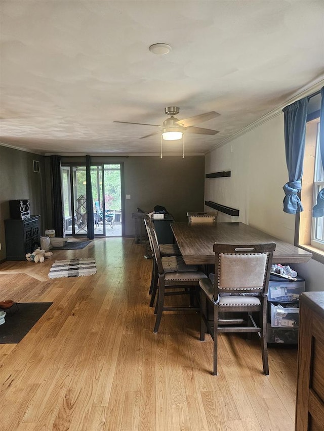 5317 Old C Rd, Boscobel, WI 53805 - dining space featuring wood finished floors, crown molding, and a ceiling fan