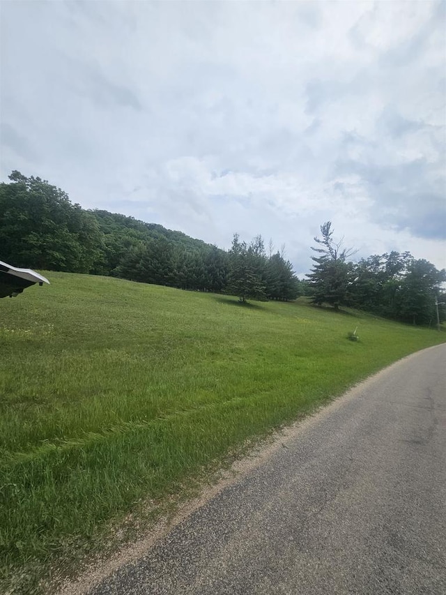 5317 Old C Rd, Boscobel, WI 53805 - view of asphalt road featuring a wooded view