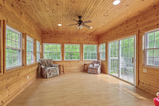 2432 Forest Hill Ct, Waukesha, WI 53188 - sunroom / solarium featuring wooden walls, recessed lighting, and wood finished floors