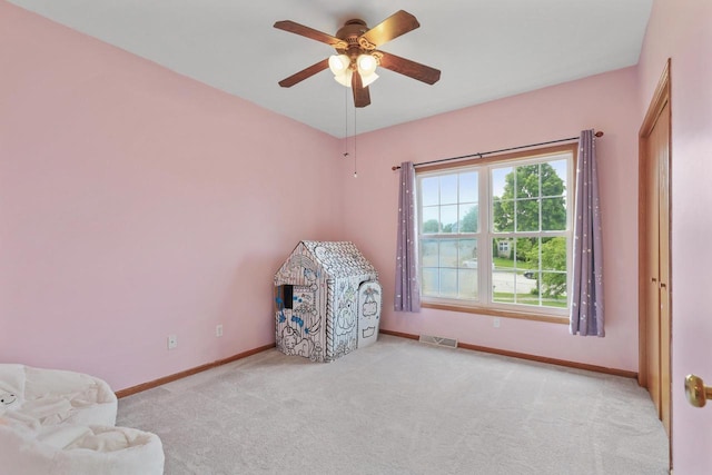 2432 Forest Hill Ct, Waukesha, WI 53188 - sitting room with carpet flooring, baseboards, and a ceiling fan