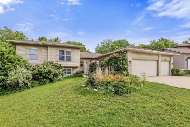 2432 Forest Hill Ct, Waukesha, WI 53188 - split level home with concrete driveway, a front lawn, and a garage