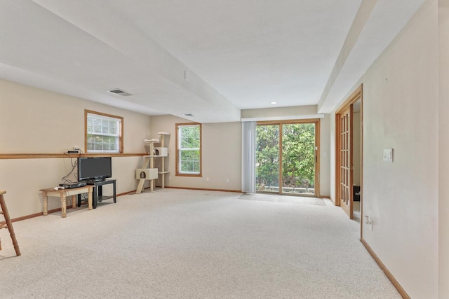 2432 Forest Hill Ct, Waukesha, WI 53188 - unfurnished living room with carpet floors and baseboards