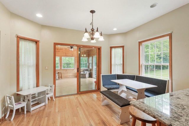 2432 Forest Hill Ct, Waukesha, WI 53188 - dining space featuring light wood-type flooring, healthy amount of natural light, a chandelier, recessed lighting, and ceiling fan