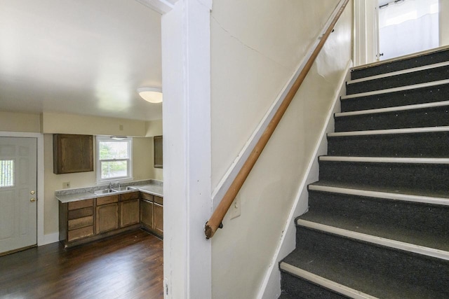 912 Harvey St, Beloit, WI 53511 - stairs featuring wood finished floors