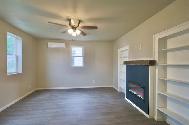 1226 Bellevue Ave, Eau Claire, WI 54703 - unfurnished living room featuring a wall mounted AC, a ceiling fan, healthy amount of natural light, and dark wood-style flooring