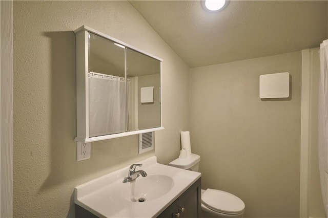 1226 Bellevue Ave, Eau Claire, WI 54703 - full bathroom featuring vanity, toilet, and a shower with shower curtain