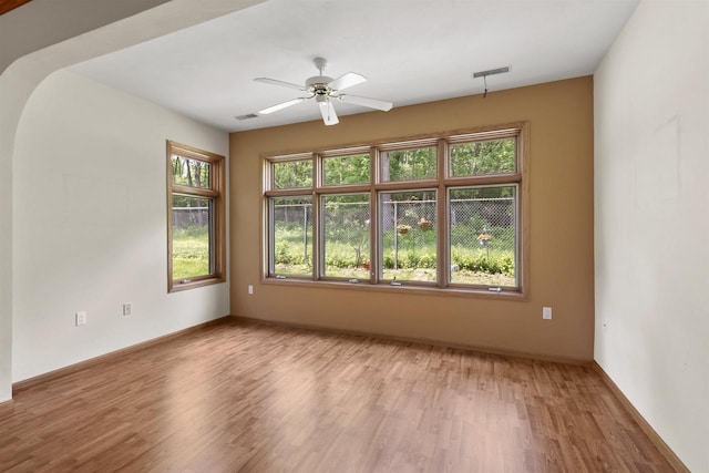 6758 Raymond Rd Unit 109, Madison, WI 53719 - unfurnished room with plenty of natural light, light wood-style floors, and a ceiling fan