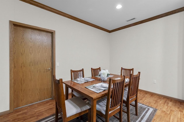 6758 Raymond Rd Unit 109, Madison, WI 53719 - dining room featuring light wood-type flooring, crown molding, and recessed lighting