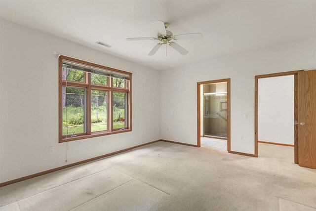 6758 Raymond Rd Unit 109, Madison, WI 53719 - spare room with light colored carpet and ceiling fan