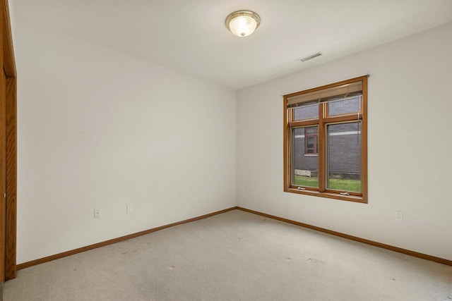 6758 Raymond Rd Unit 109, Madison, WI 53719 - unfurnished room with baseboards and light colored carpet