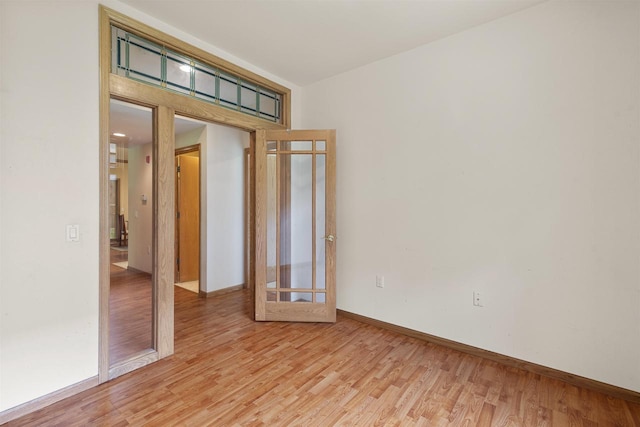 6758 Raymond Rd Unit 109, Madison, WI 53719 - unfurnished room featuring light wood finished floors and baseboards