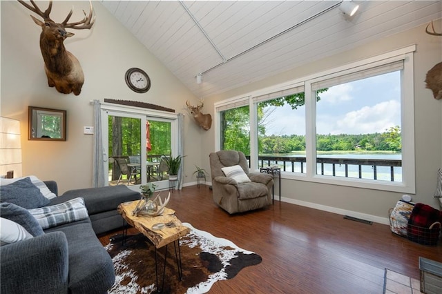 living area featuring healthy amount of natural light, wood finished floors, baseboards, high vaulted ceiling, and wood ceiling