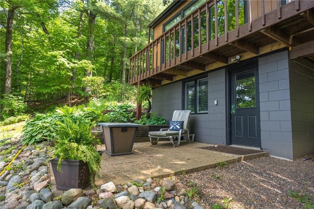 view of patio / terrace featuring a wooden deck