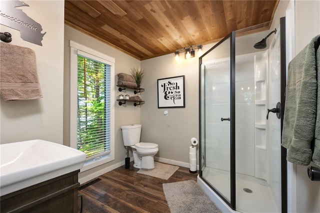 full bathroom with wood ceiling, a shower stall, vanity, wood finished floors, and toilet
