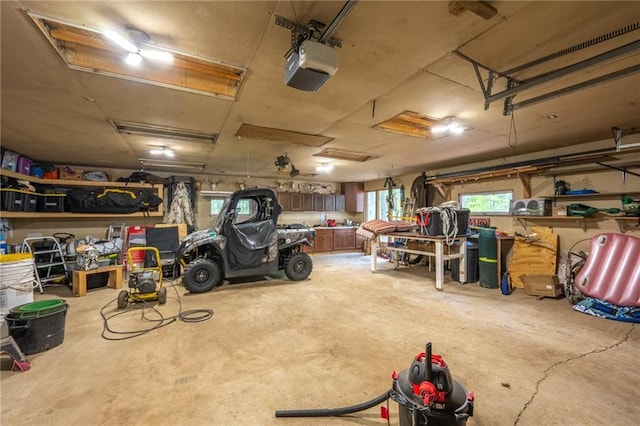 garage featuring a garage door opener