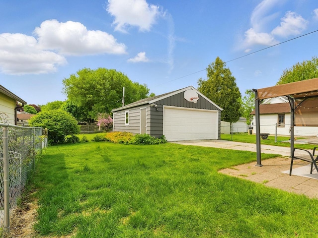 409 Huron St, Manitowoc, WI 54220 - view of yard with a detached garage and an outbuilding